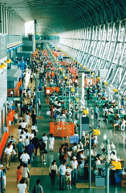 A busy airport with a sign that says ' a ' on it