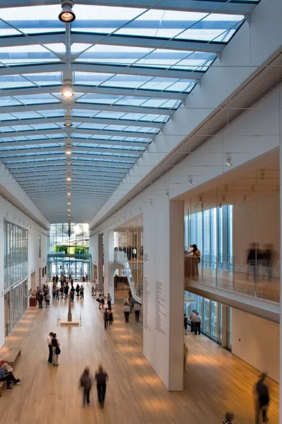 The inside of a building with a large glass roof