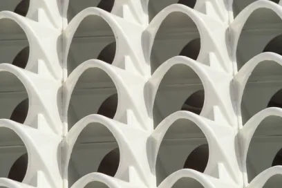 A close up of a white geometric pattern on a building