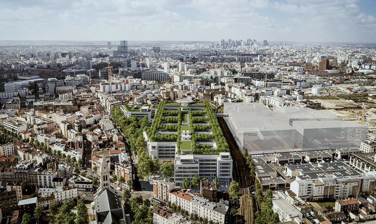 An aerial view of a city with a lot of buildings and trees