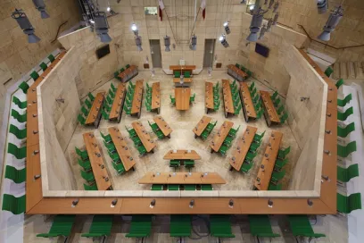 An aerial view of a conference room filled with tables and chairs