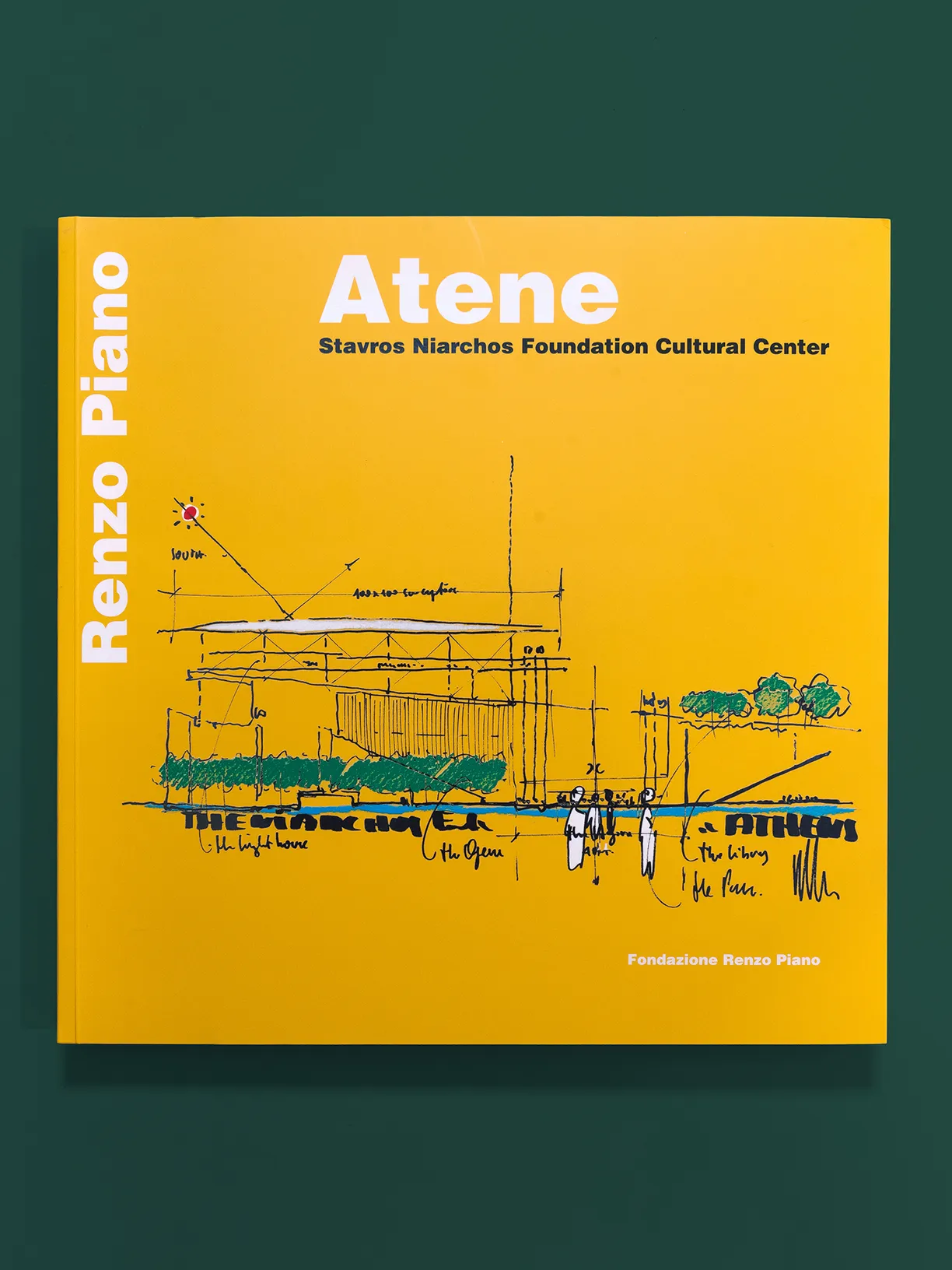 A yellow book titled atene by renzo piano