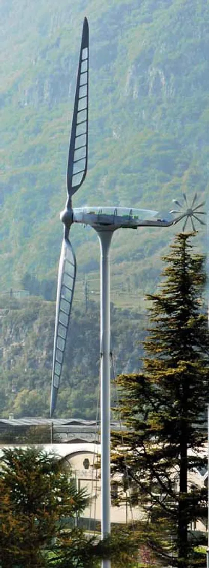 a large wind turbine is sitting in the middle of a forest .