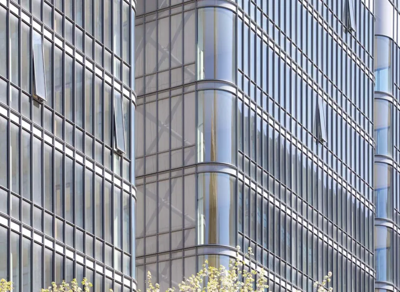 a close up of a tall building with a lot of windows .