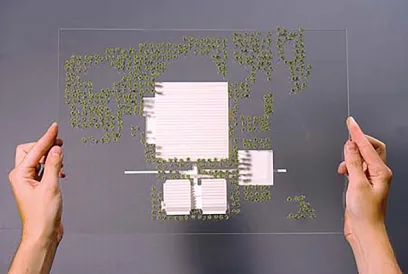 A person is holding a piece of paper with a diagram on it