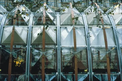 it looks like a greenhouse with a lot of windows .