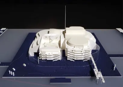 A model of a large building is sitting on top of a table