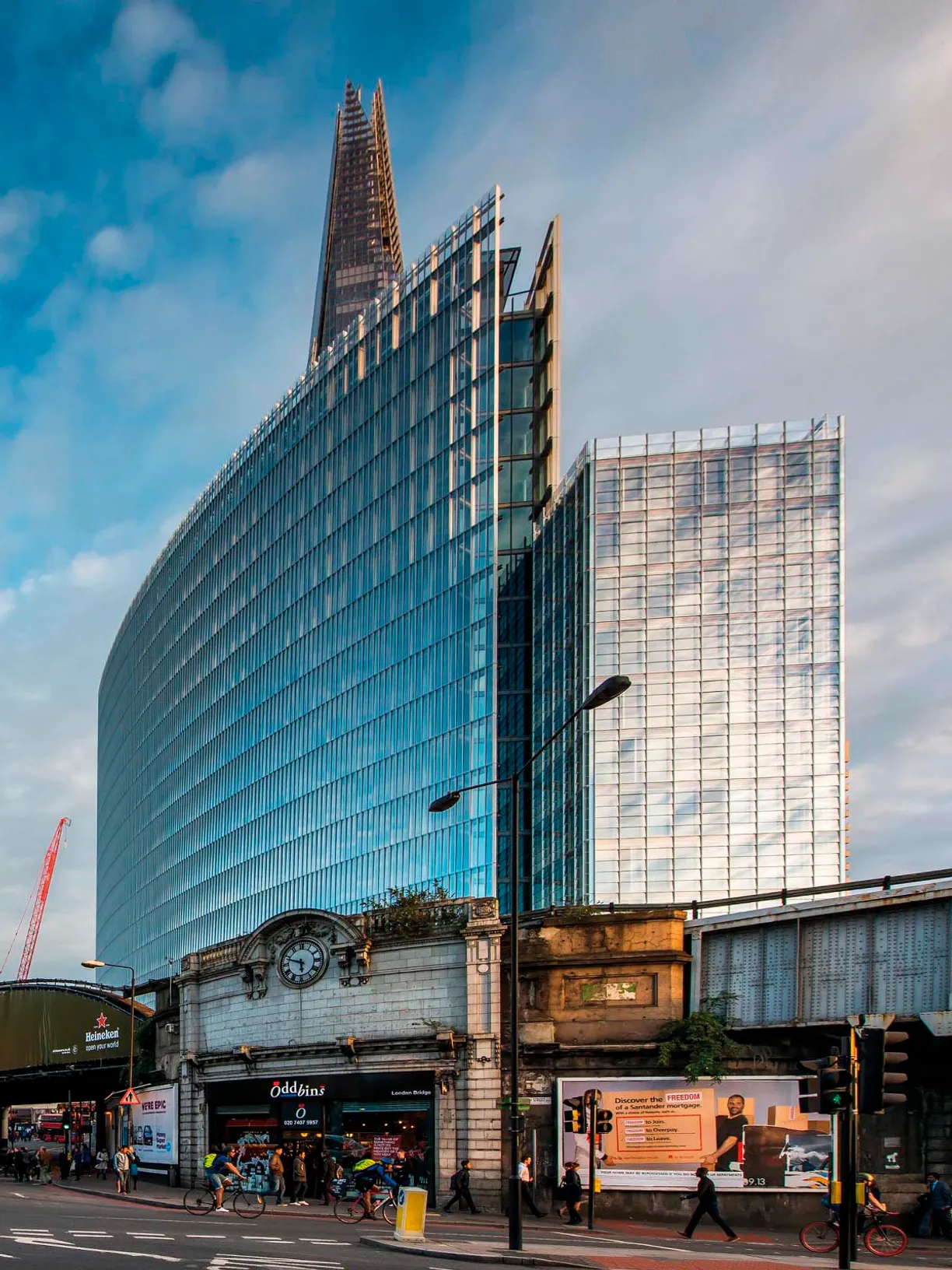 a large building with a clock on the side of it