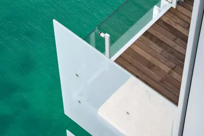 An aerial view of a balcony overlooking the ocean