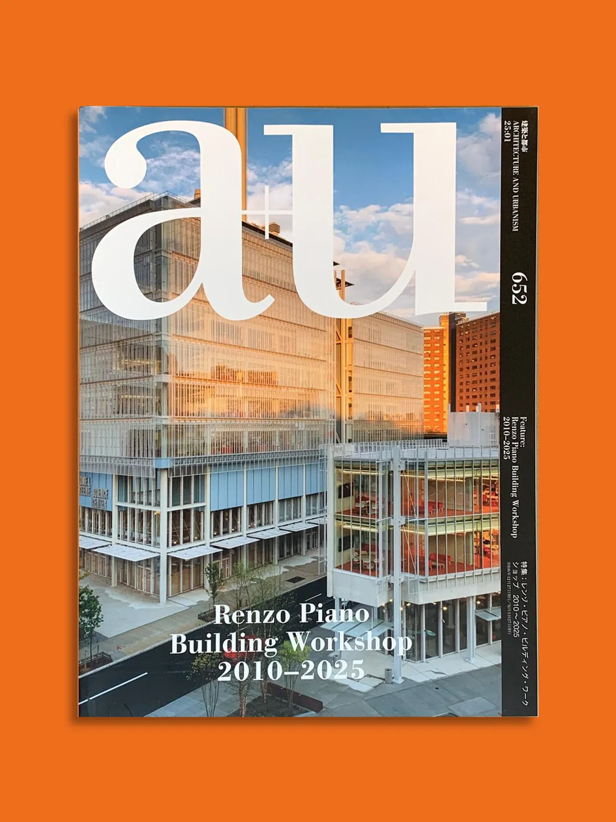 an orange cover of a magazine titled au