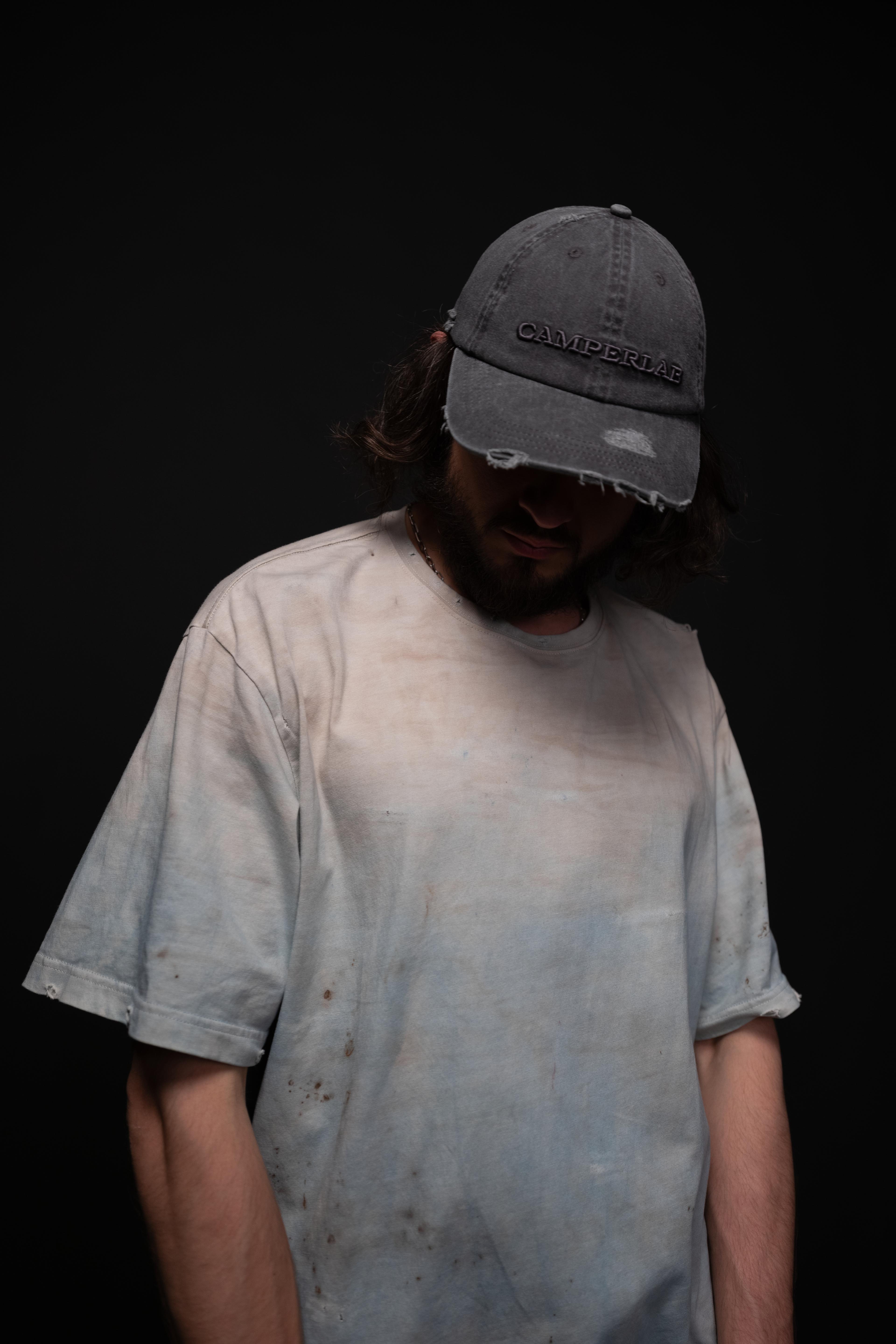 indigo-dyed t-shirt with rust print - state of the island