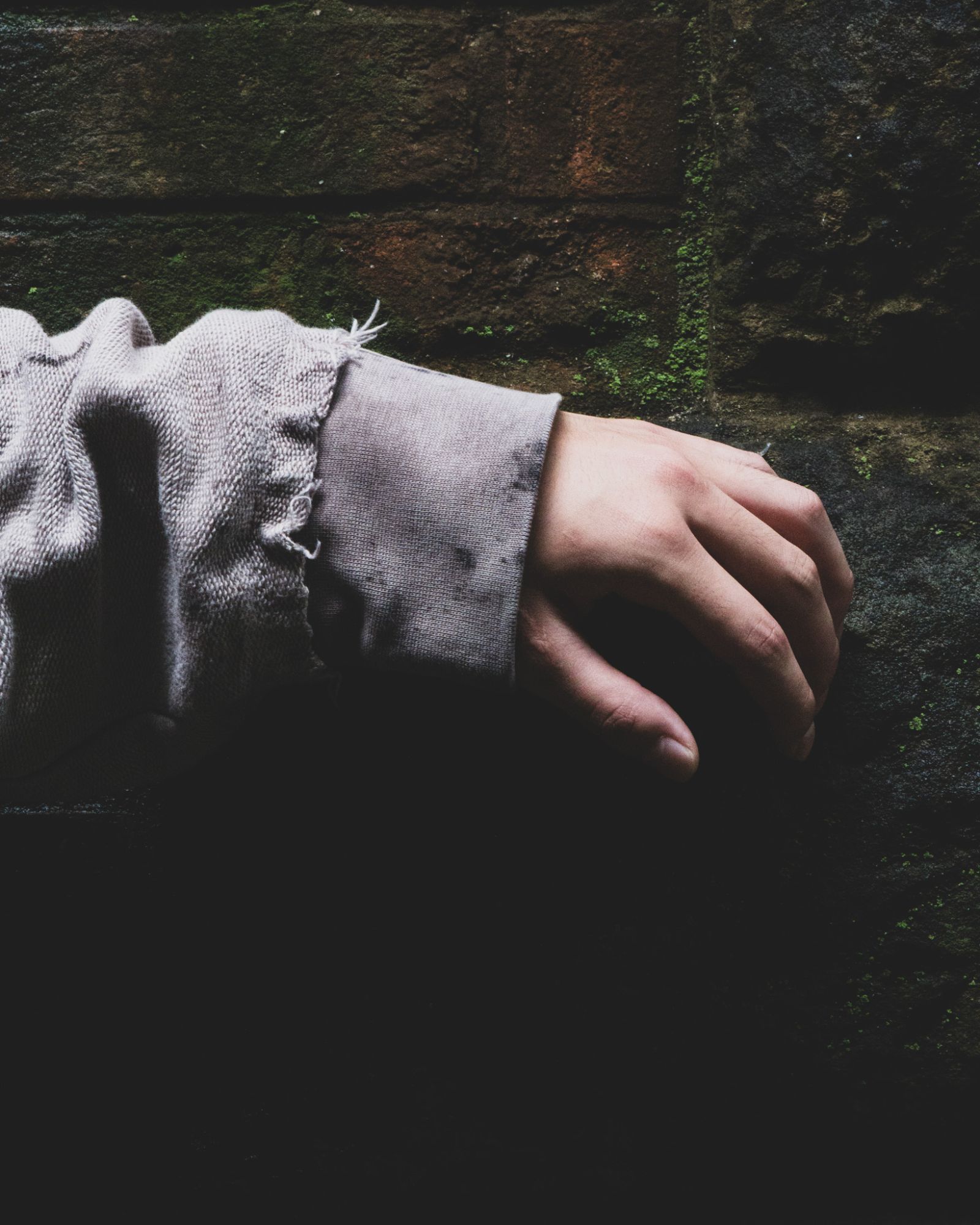 Cuff against a brick wall