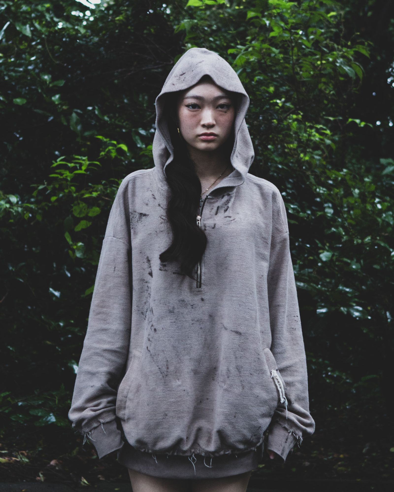 Front, hood up, in the forest