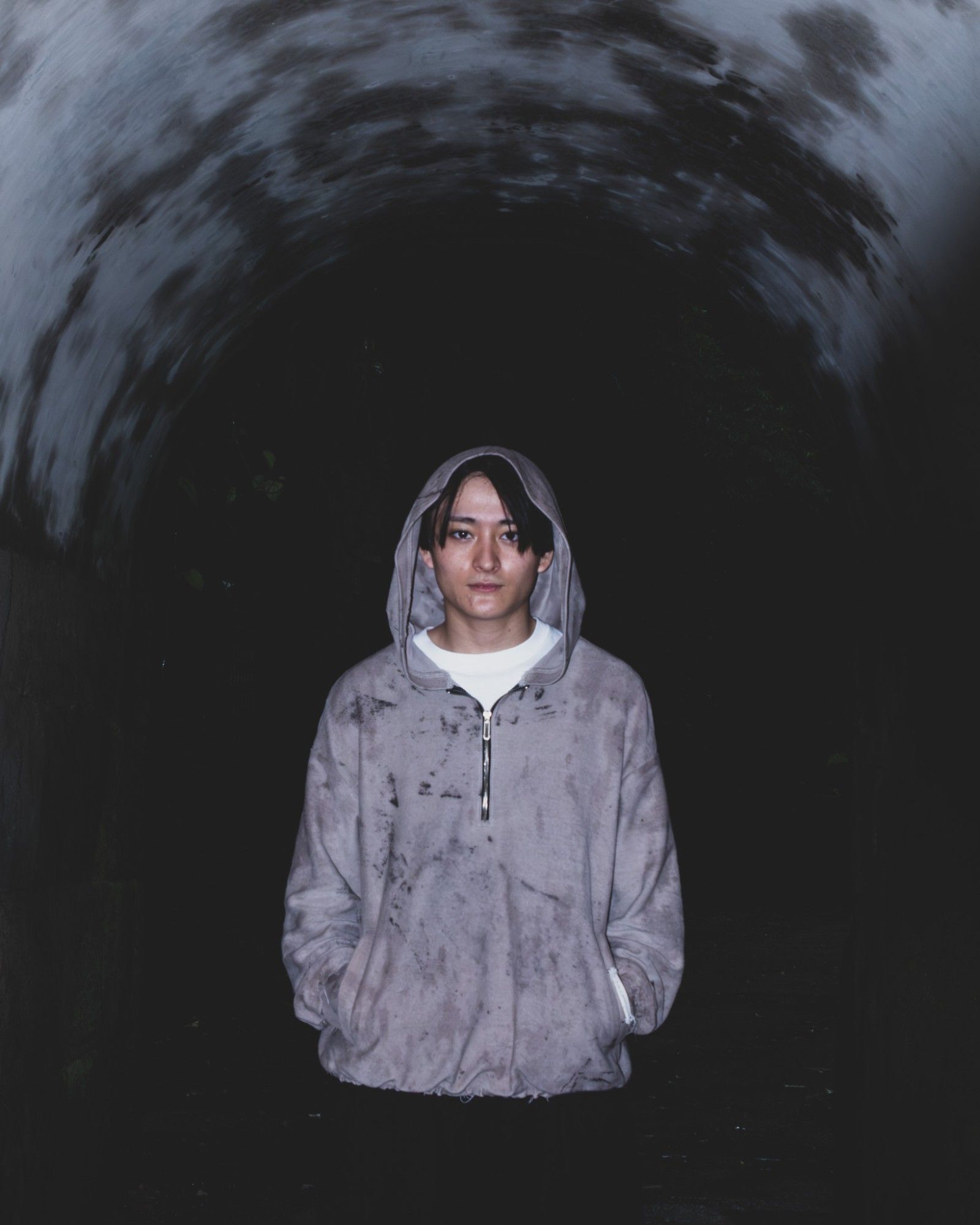 In a tunnel, hood up