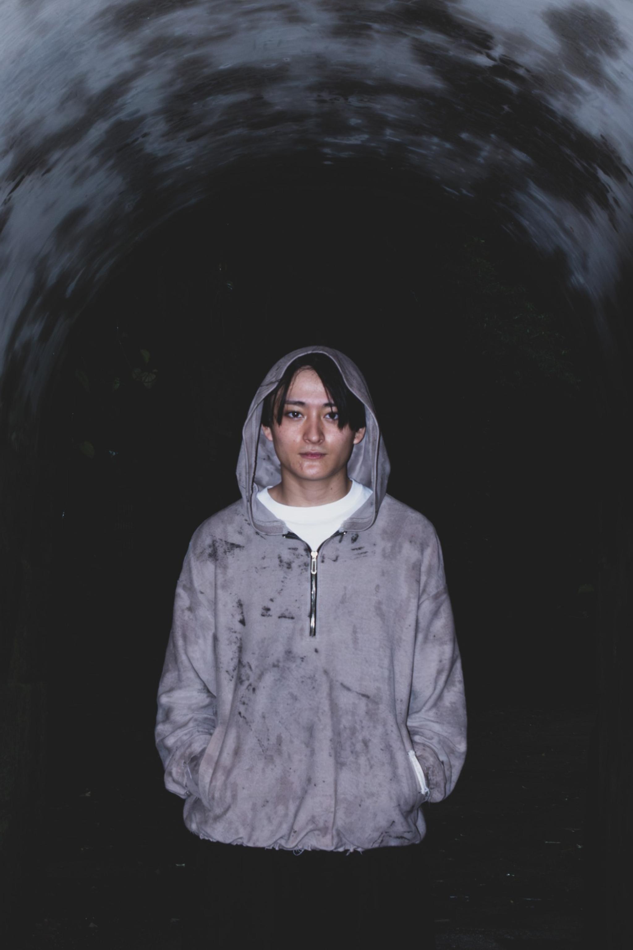 In a tunnel, hood up
