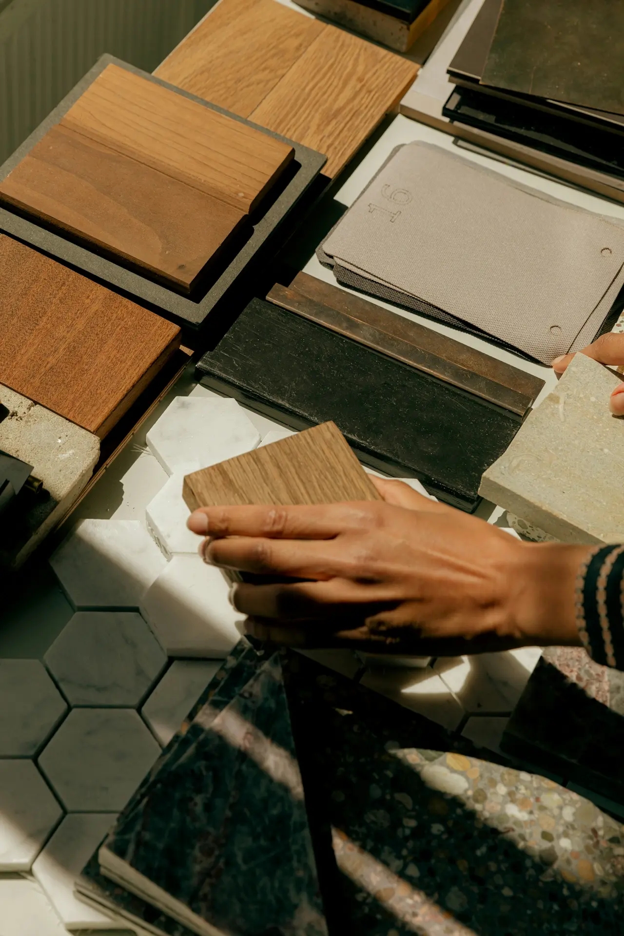 woman placing object in table