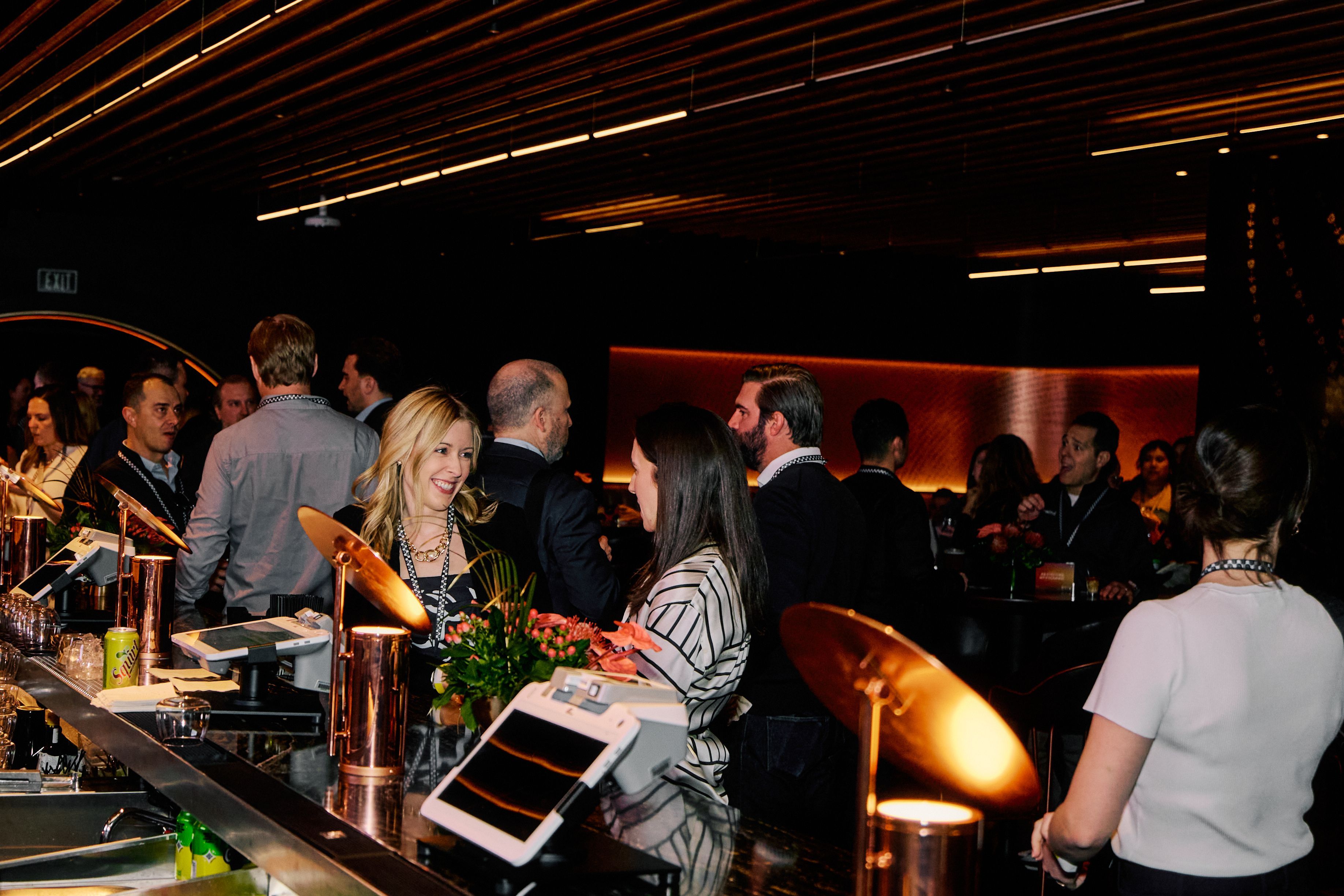 Guests enjoying the event in the Theory Lounge at the Las Vegas Sphere
