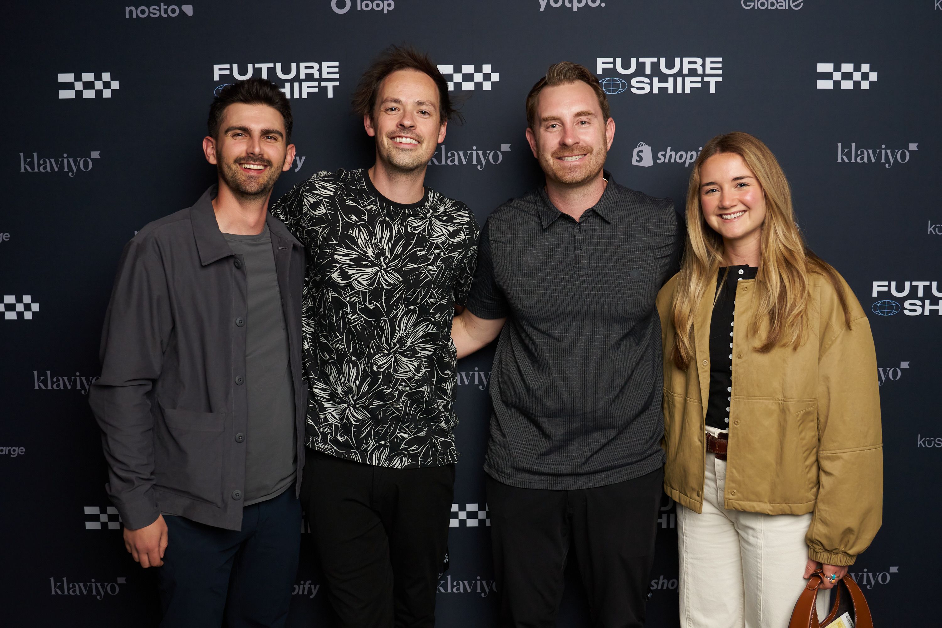Guests in front of our step & repeat