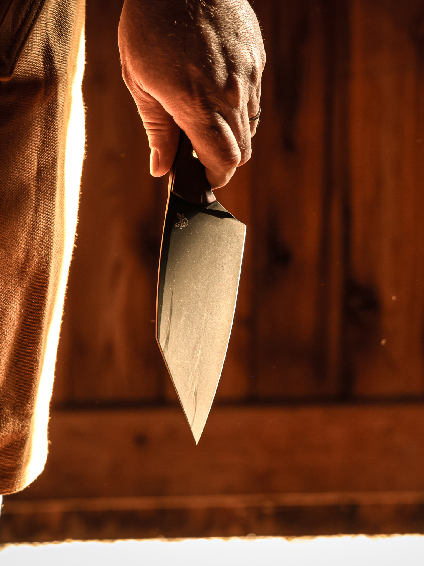 Hand holding sharp Benchmade knife