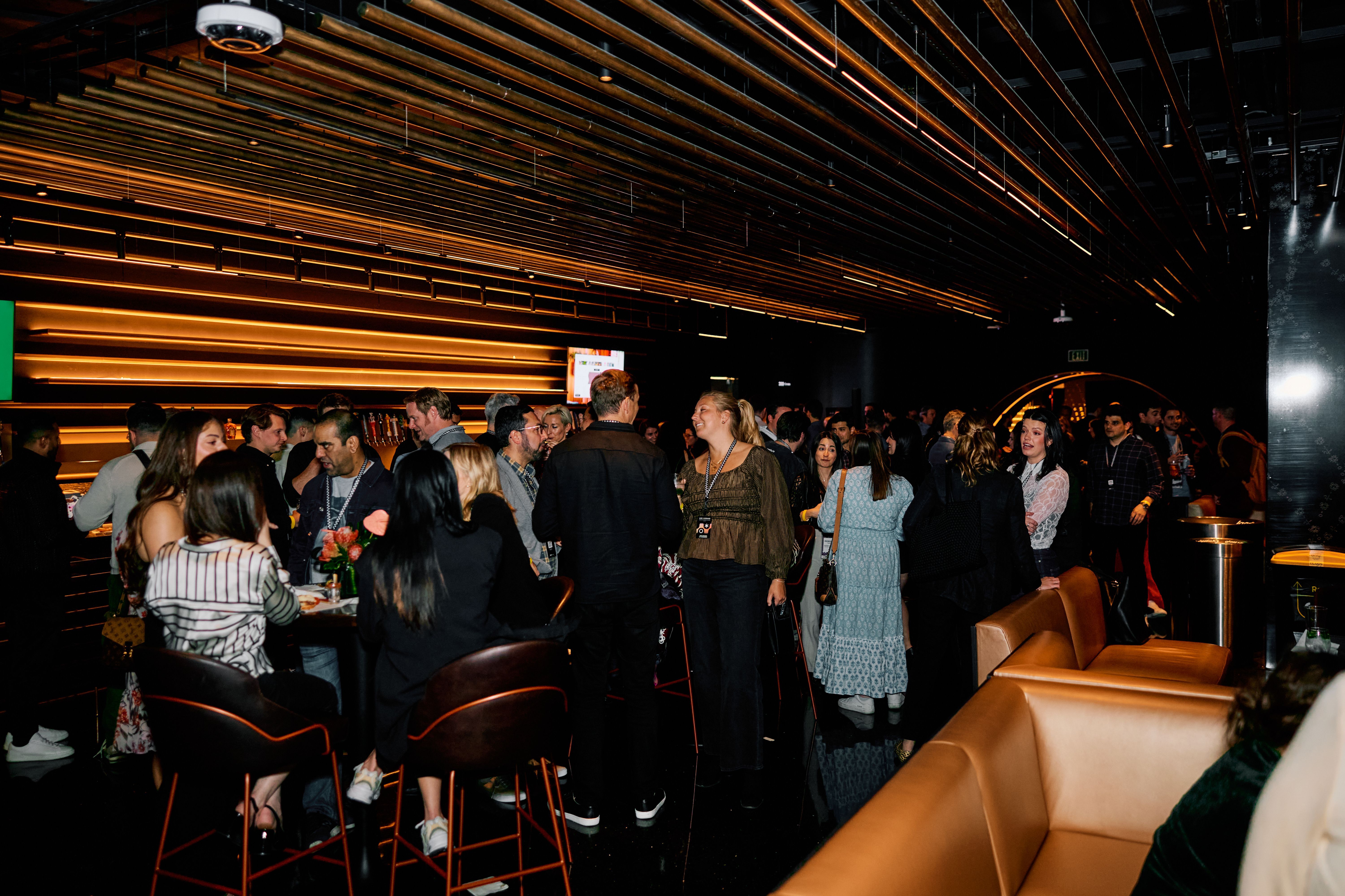 Guests enjoying the event in the Theory Lounge of the Las Vegas Sphere
