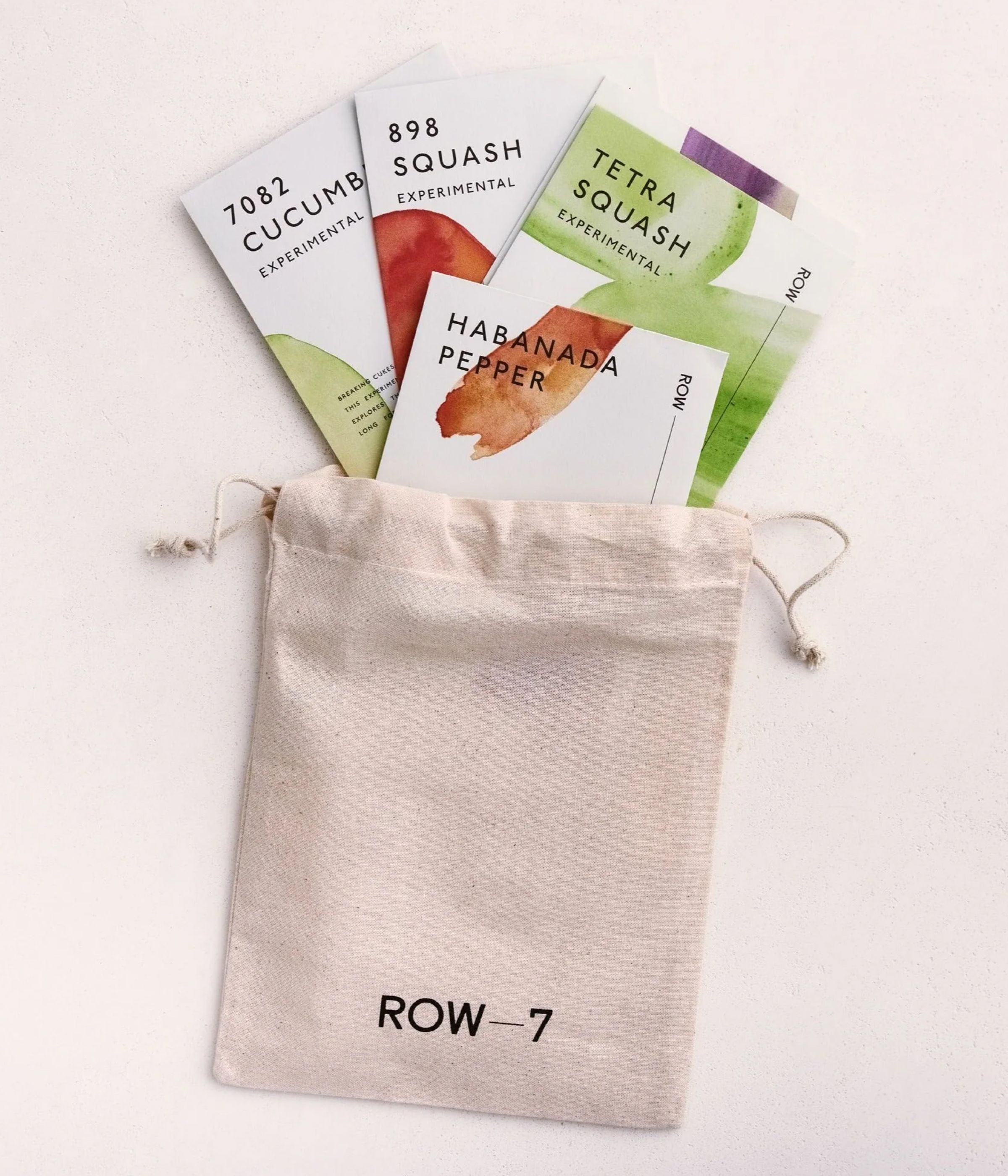 Seed packets in a small drawstring bag