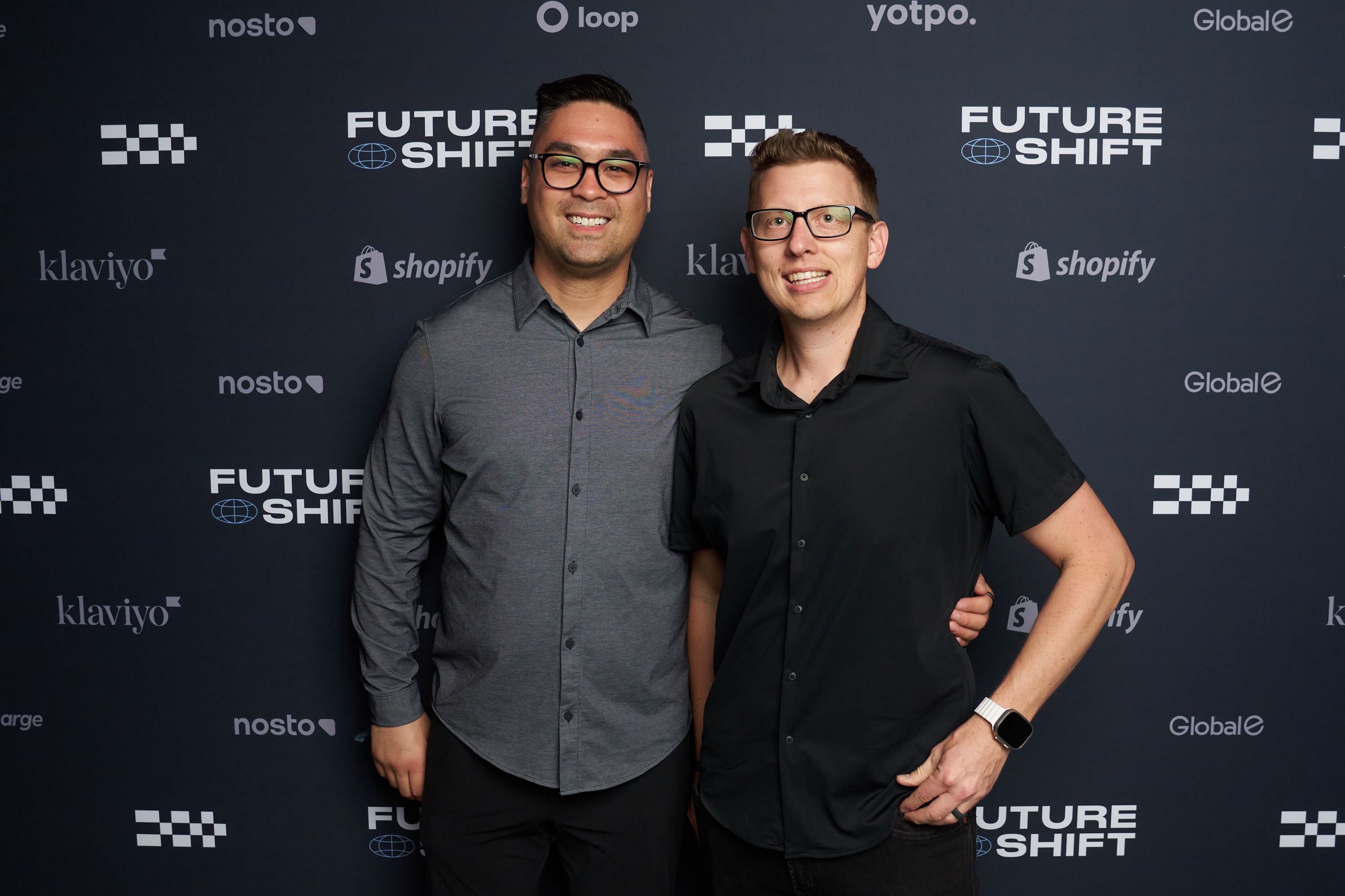 Guests in front of our step & repeat