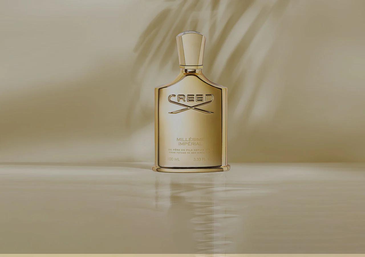 Creed bottle on a rock