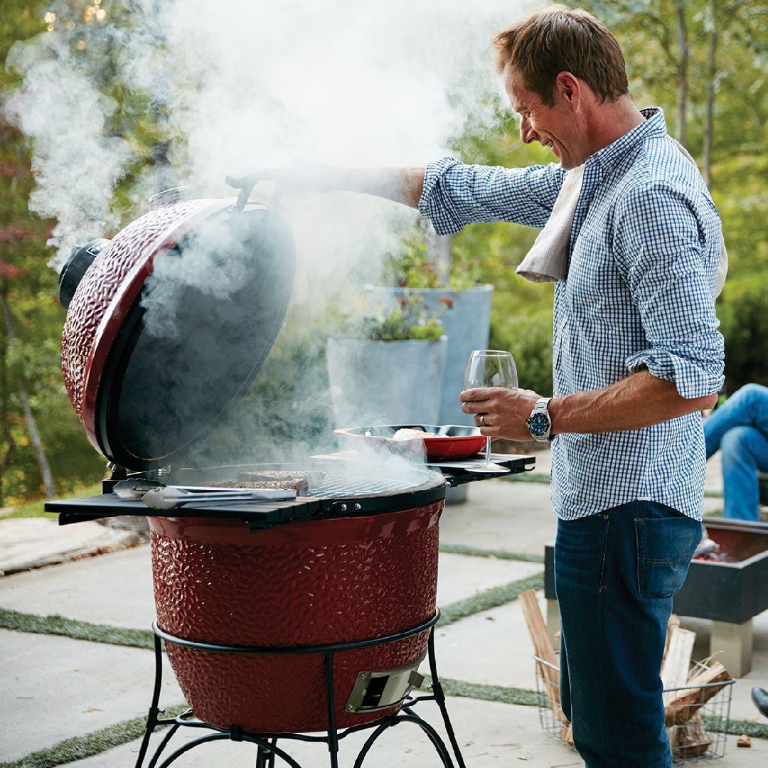 Man using a BBQ