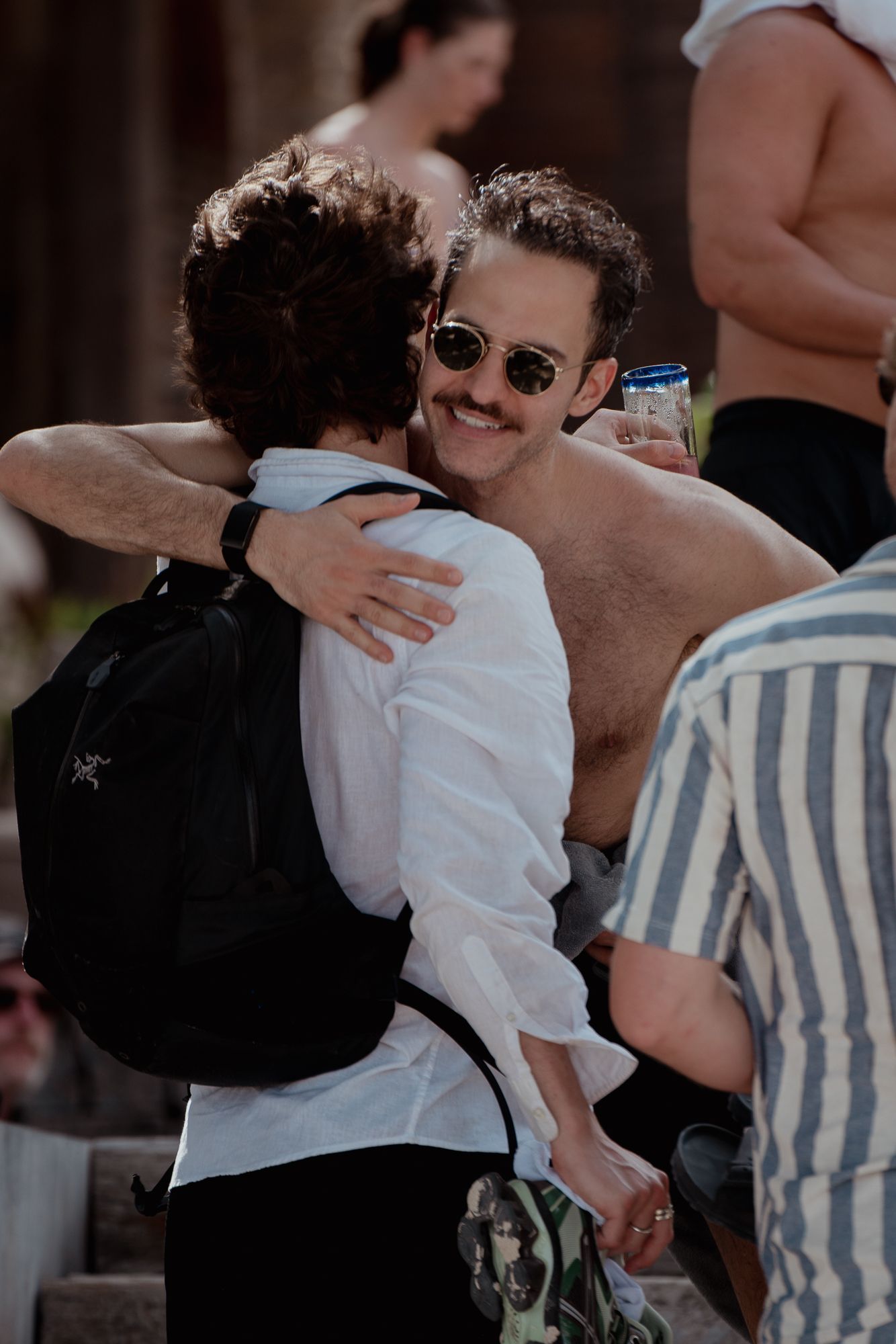 Two Someone team members greeting each other