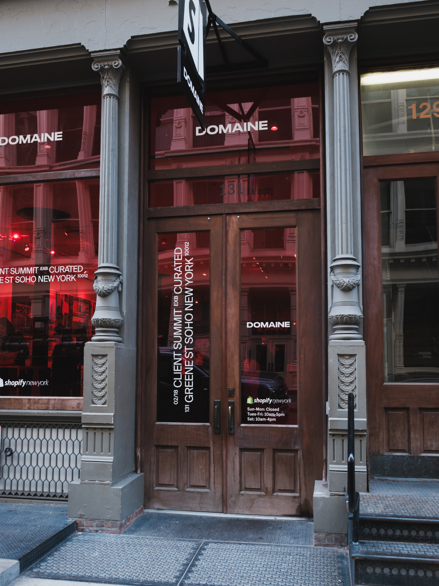 Facade of Shopify New York featuring Someone's Curated Summit branding