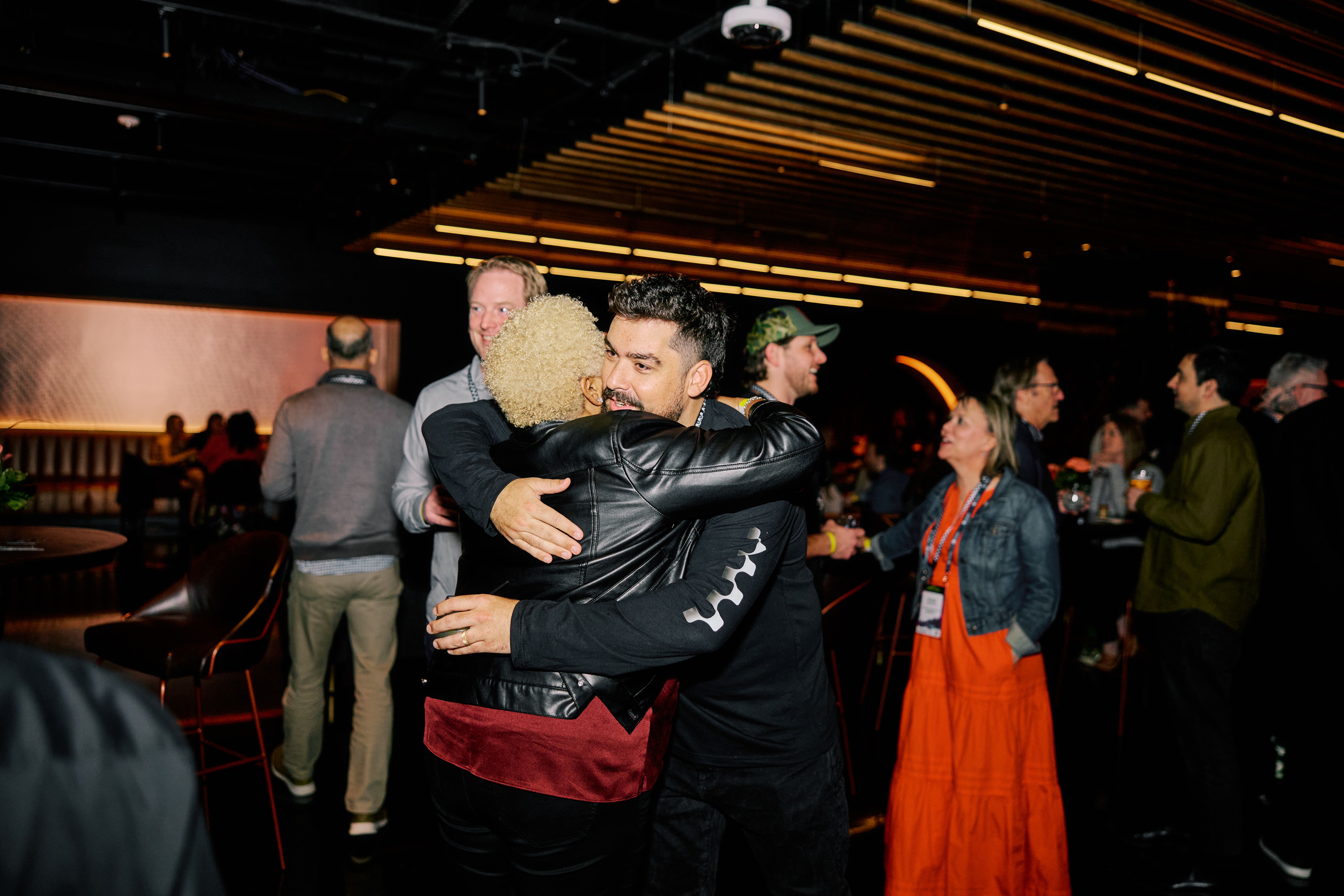 Mac greeting a guest