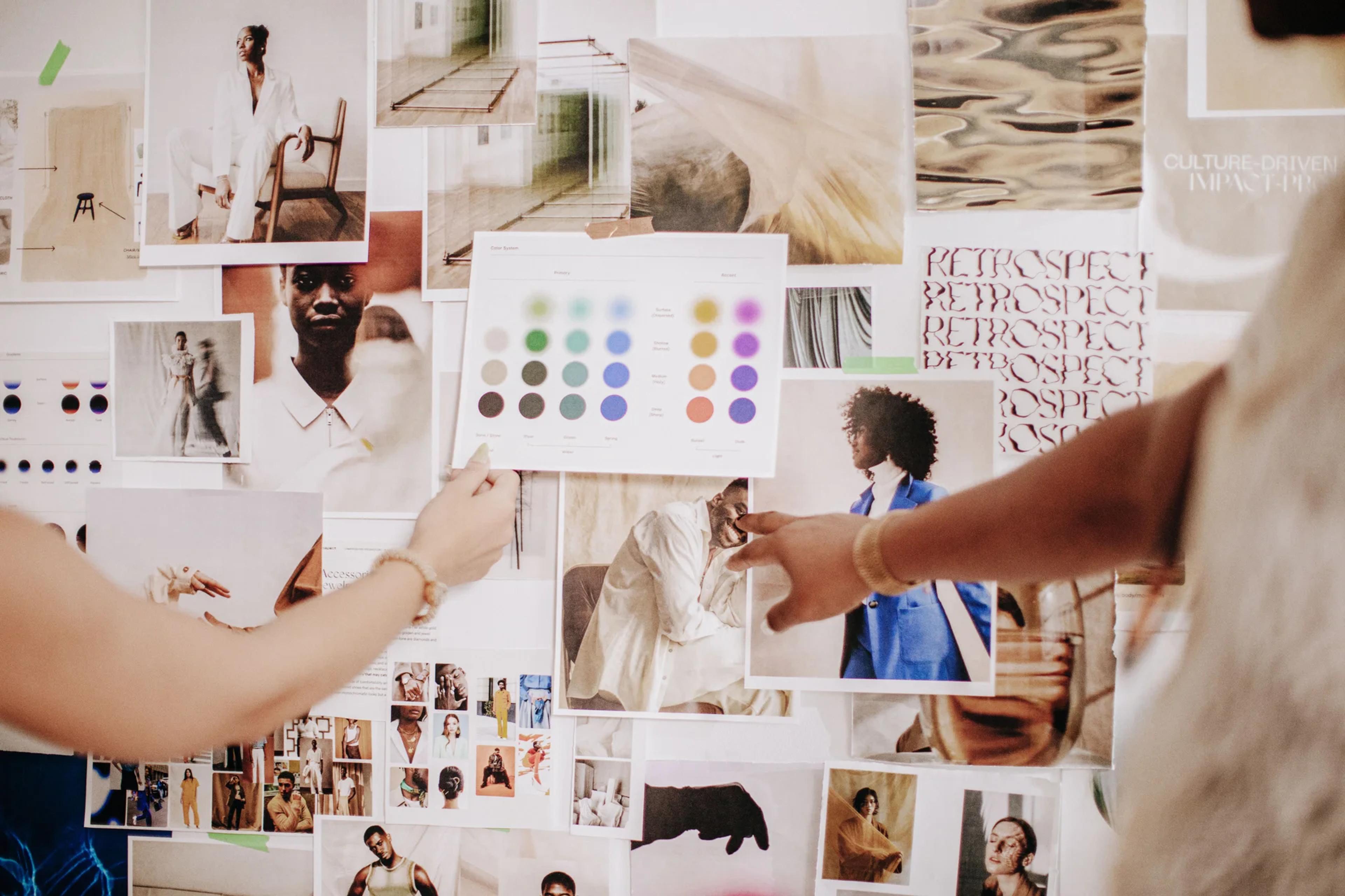 Select images pinned up on a wall during a brainstorm session.