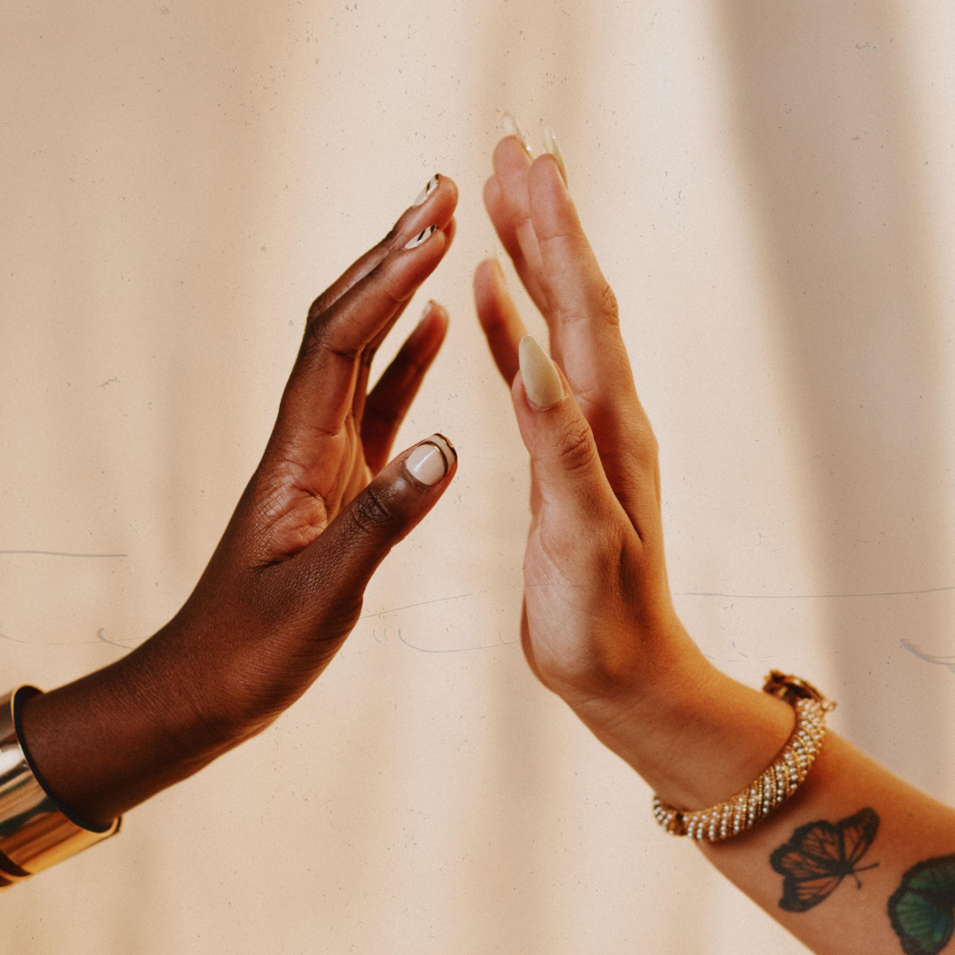 A close up shot of Retrospect team members high-fiving