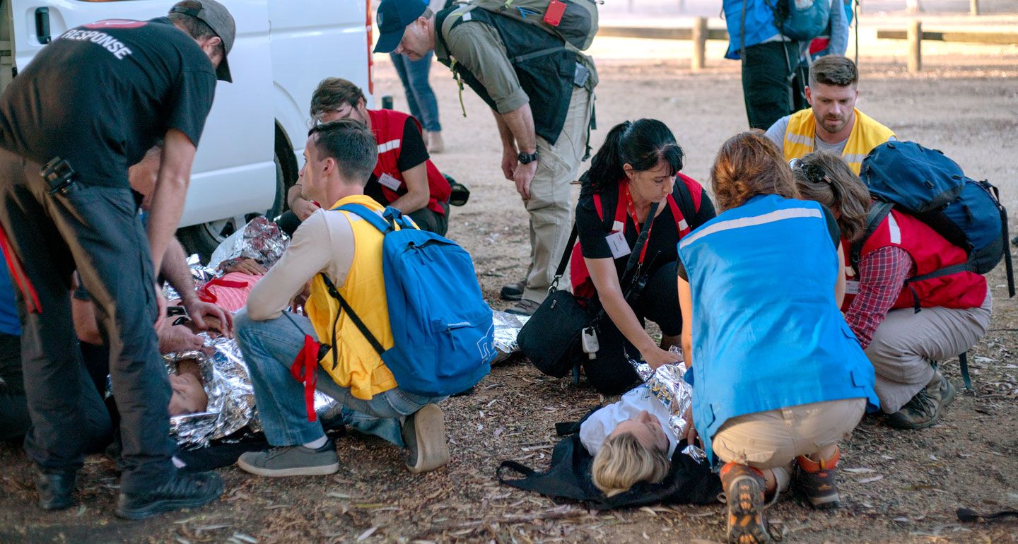 HEAT participants providing casualty care during a simulation