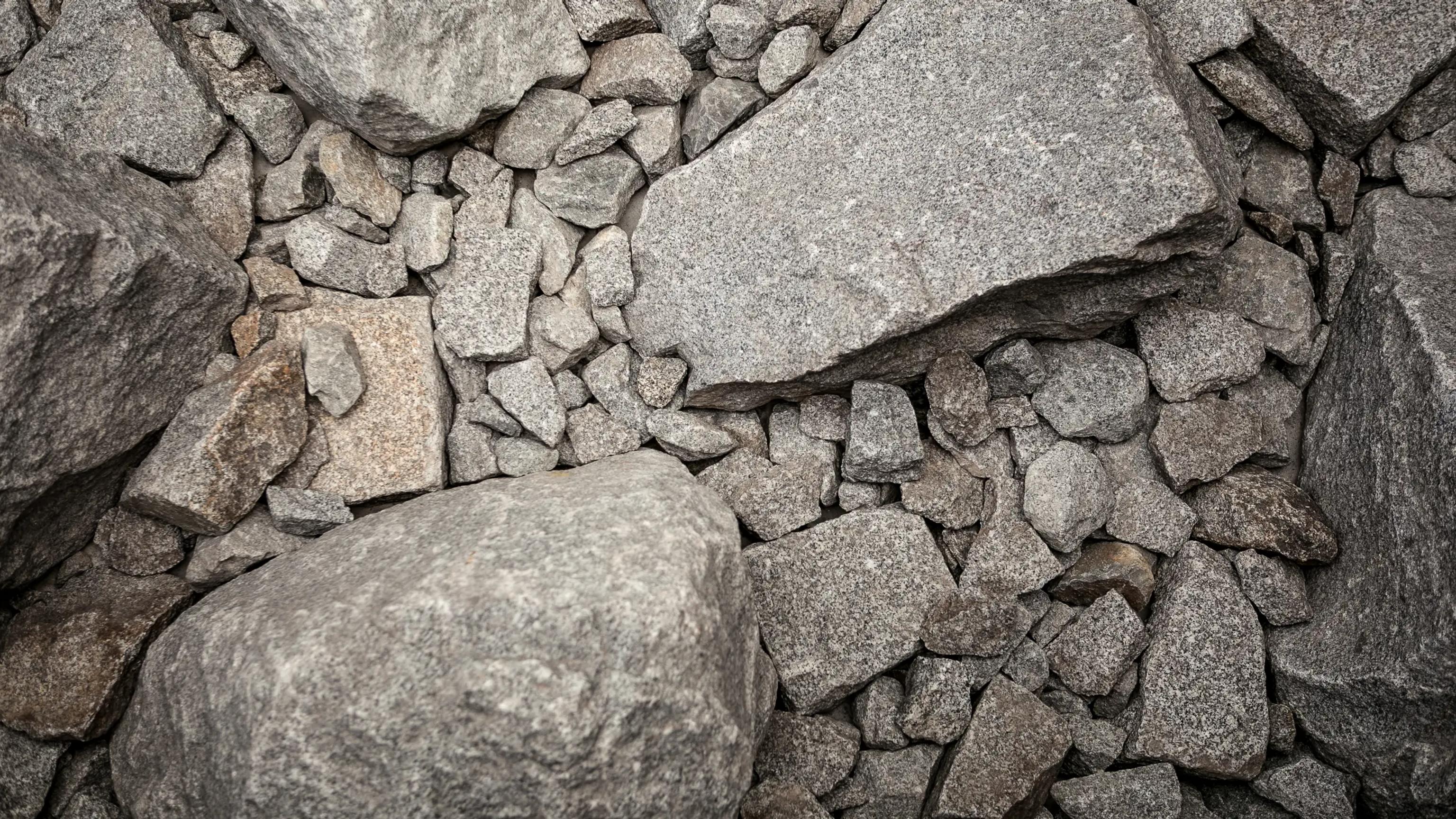 Close-up of grey granite rocks and gravel