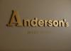 Gold lettering on a wall reading Anderson's, Made in Italy