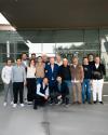 A group portrait of the Maglificio Gran Sasso team outside their factory