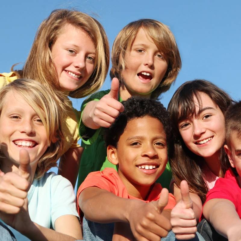 Kids with thumbs up
