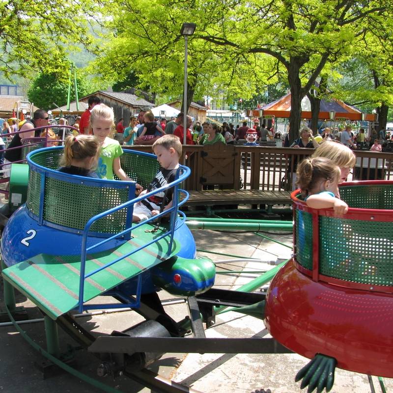 Kids riding the Turtles Kiddie Ride at DelGrosso's Amusement Park