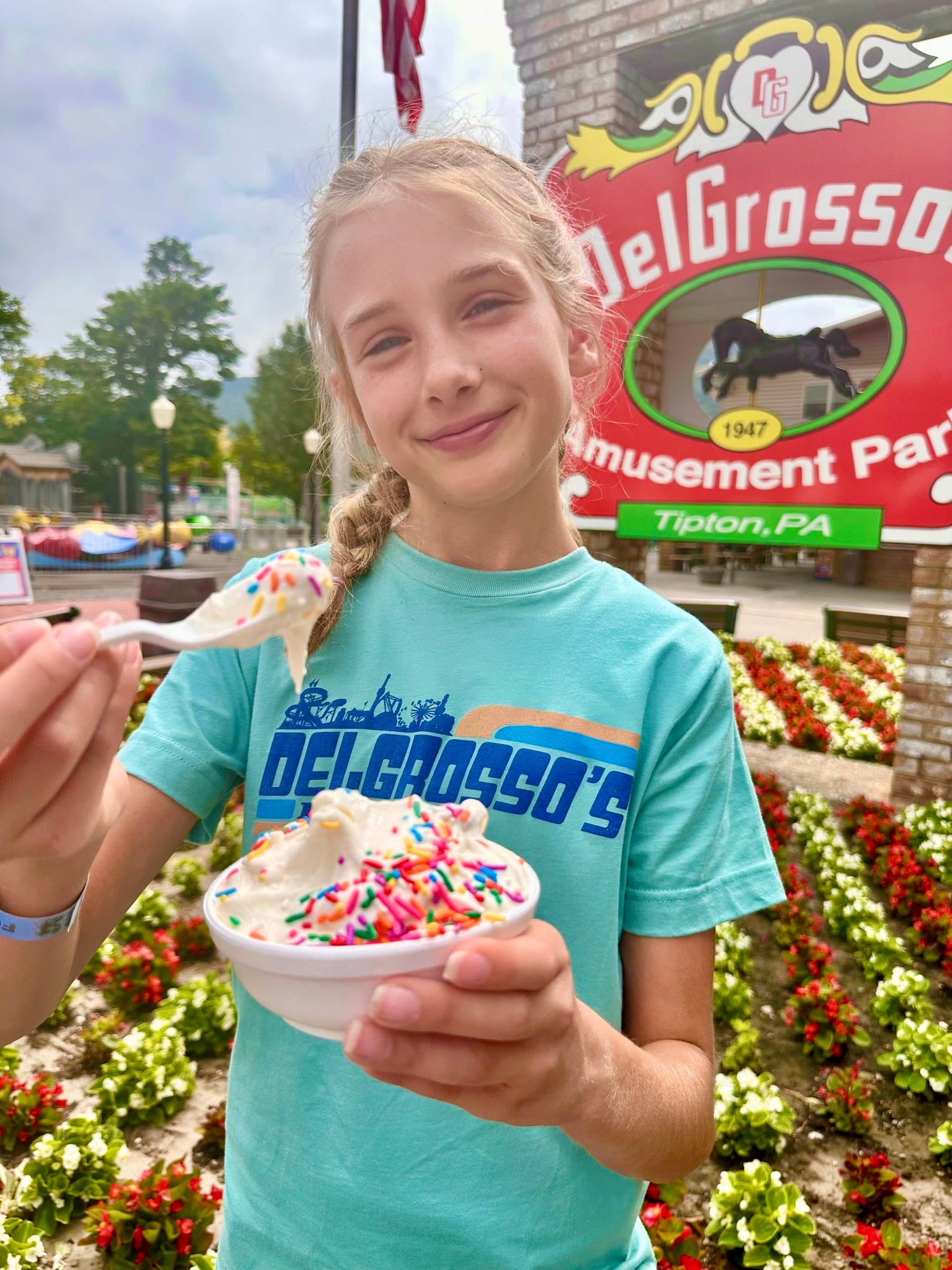 girl eating icecream at DelGrosso's Park.