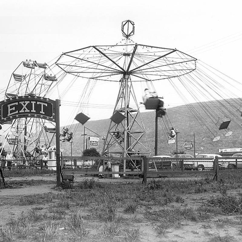 Historical photo of Bland's Park swing ride