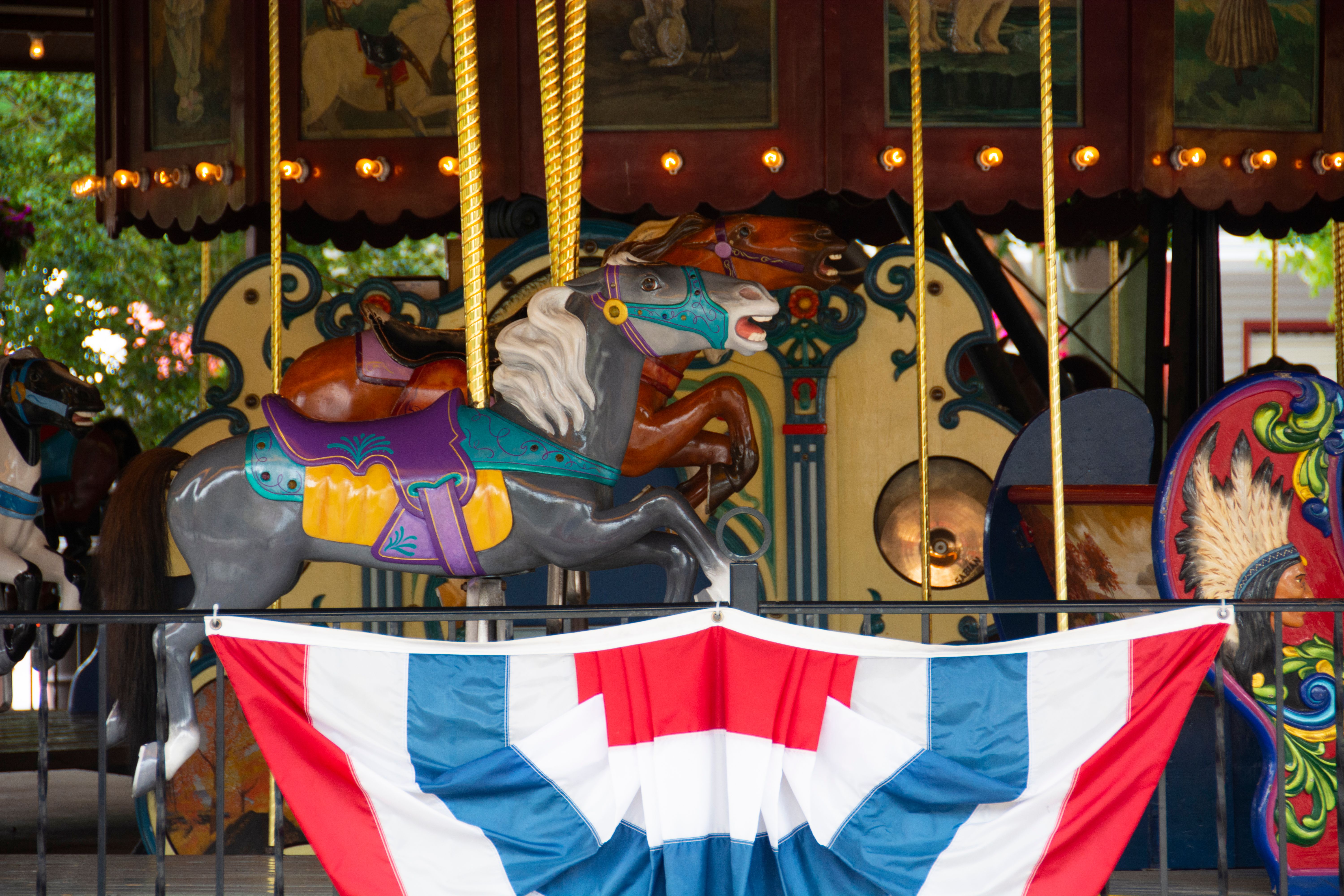 Antique Carouselle at DelGrosso's Park with American Flag bunting.
