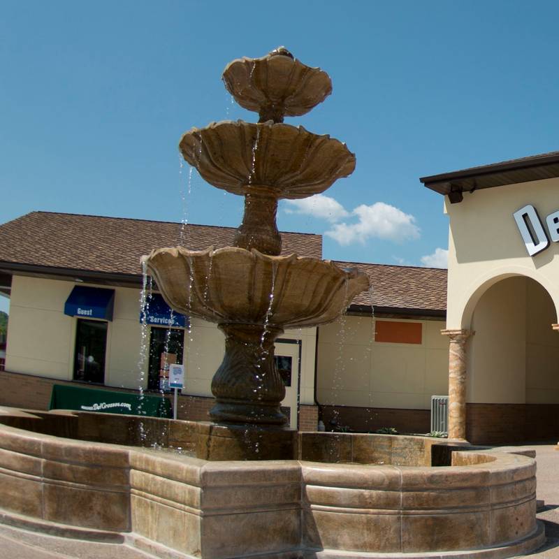 DelGrosso's Park Entrance with water fountain and Guest Services building.