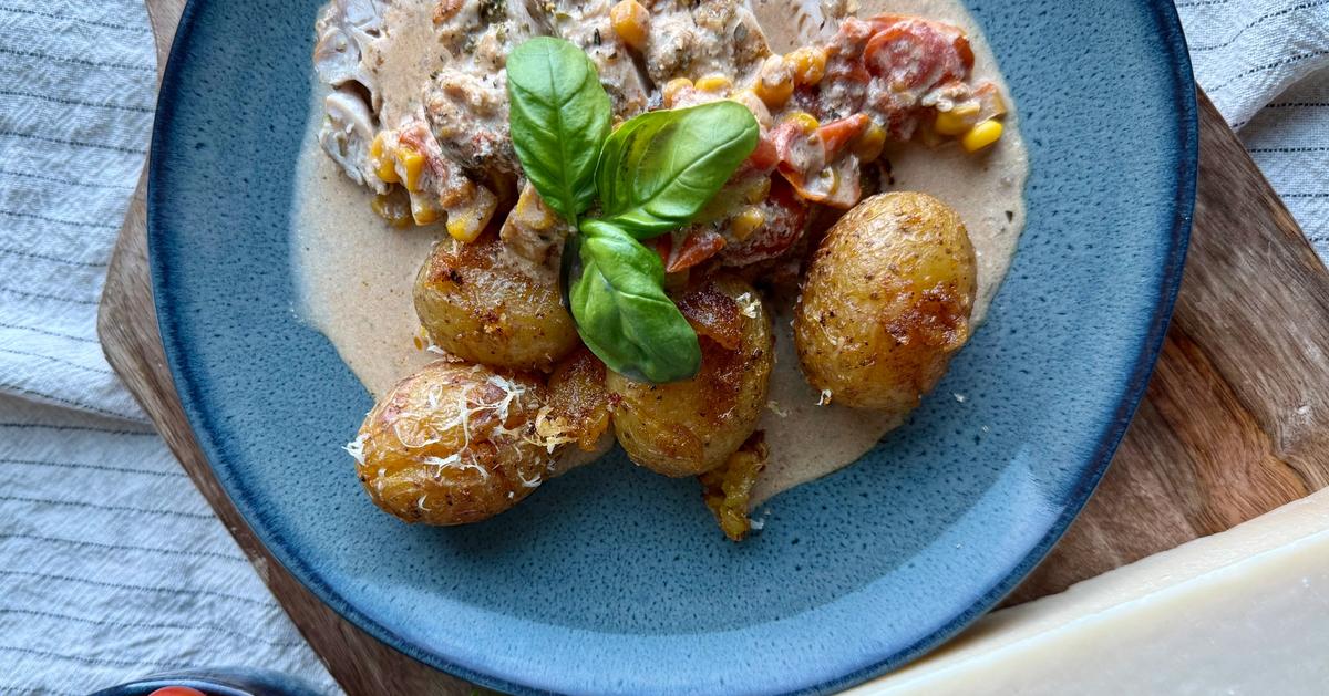 Kylling med tomater og mais i fløtesaus