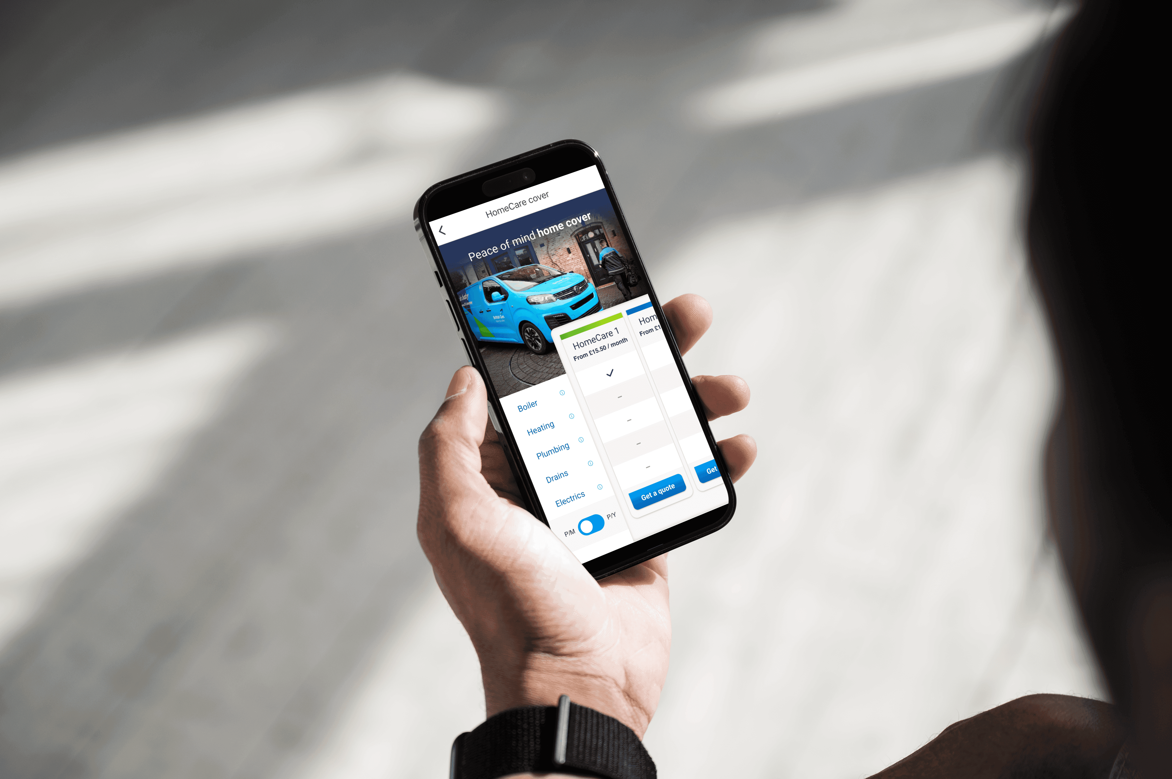 Person holding a phone, showing a prototype of the Homecare journey