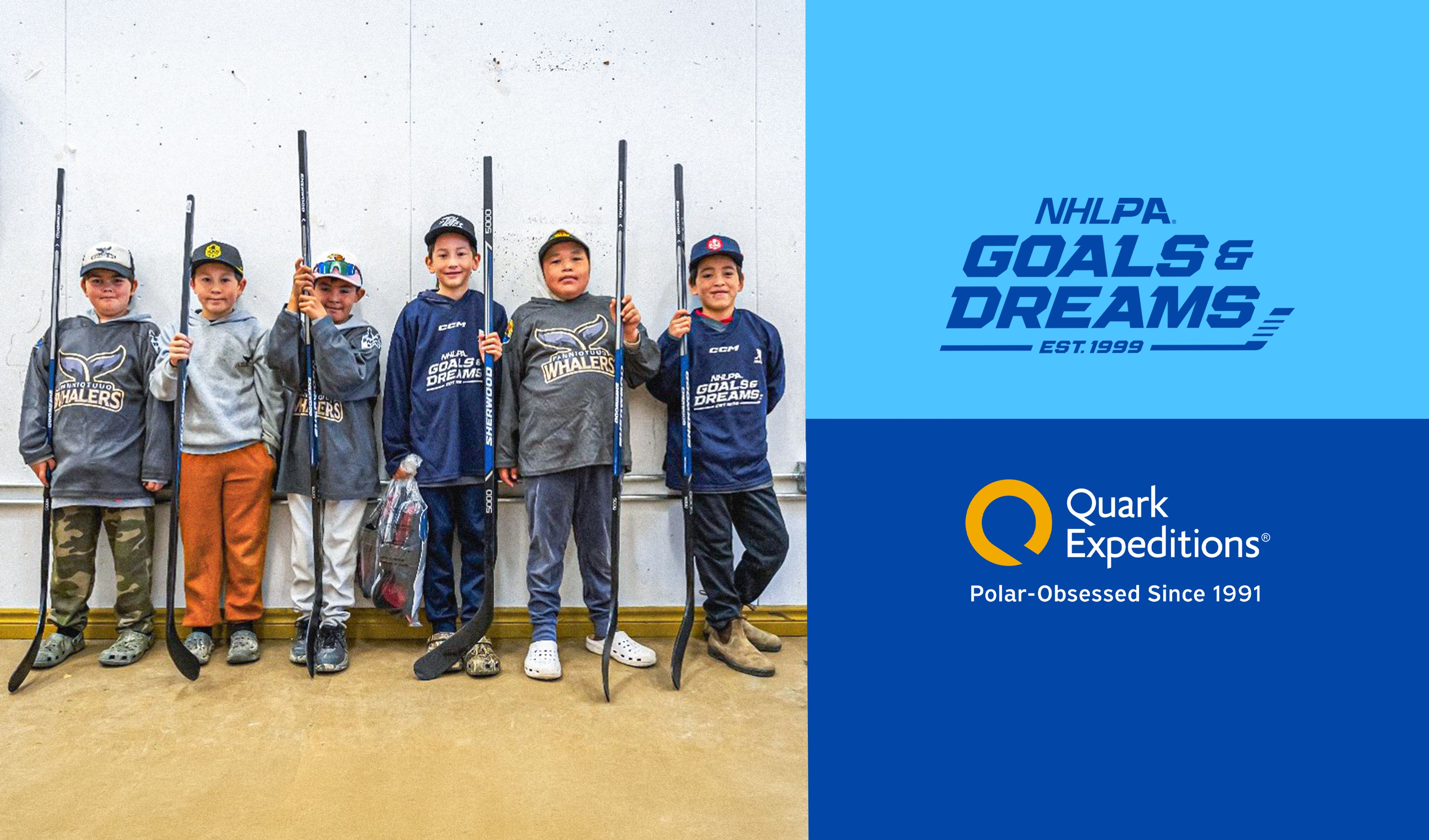 Six young boys holding hockey sticks, with NHLPA Goals & Dreams and Quark Expeditions logos.