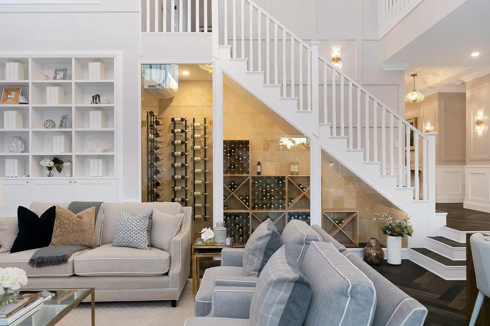 Custom under-stair wine cellar integrated into a luxury ground floor layout.