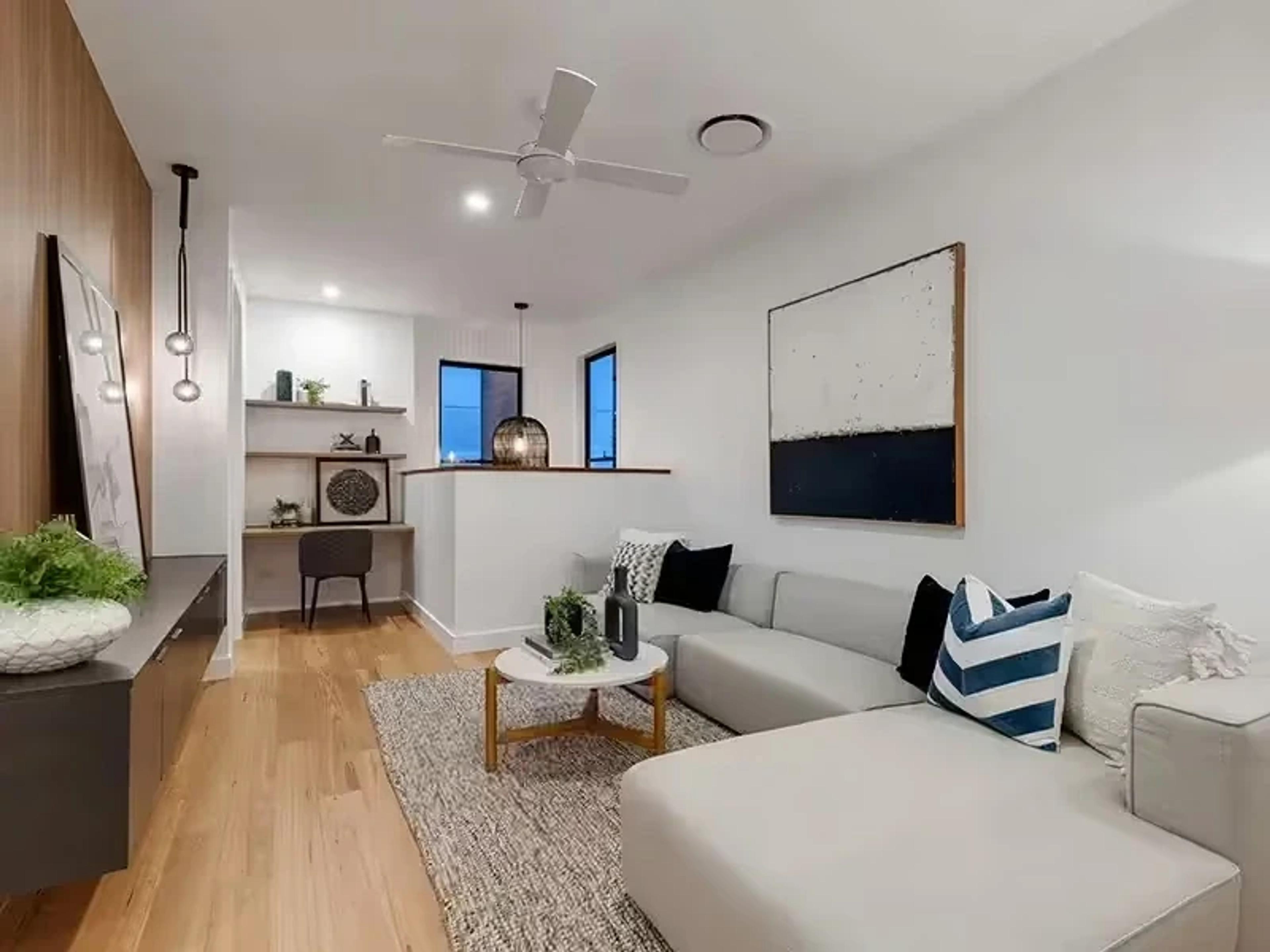 Living room with sectional lounge and built in study nook