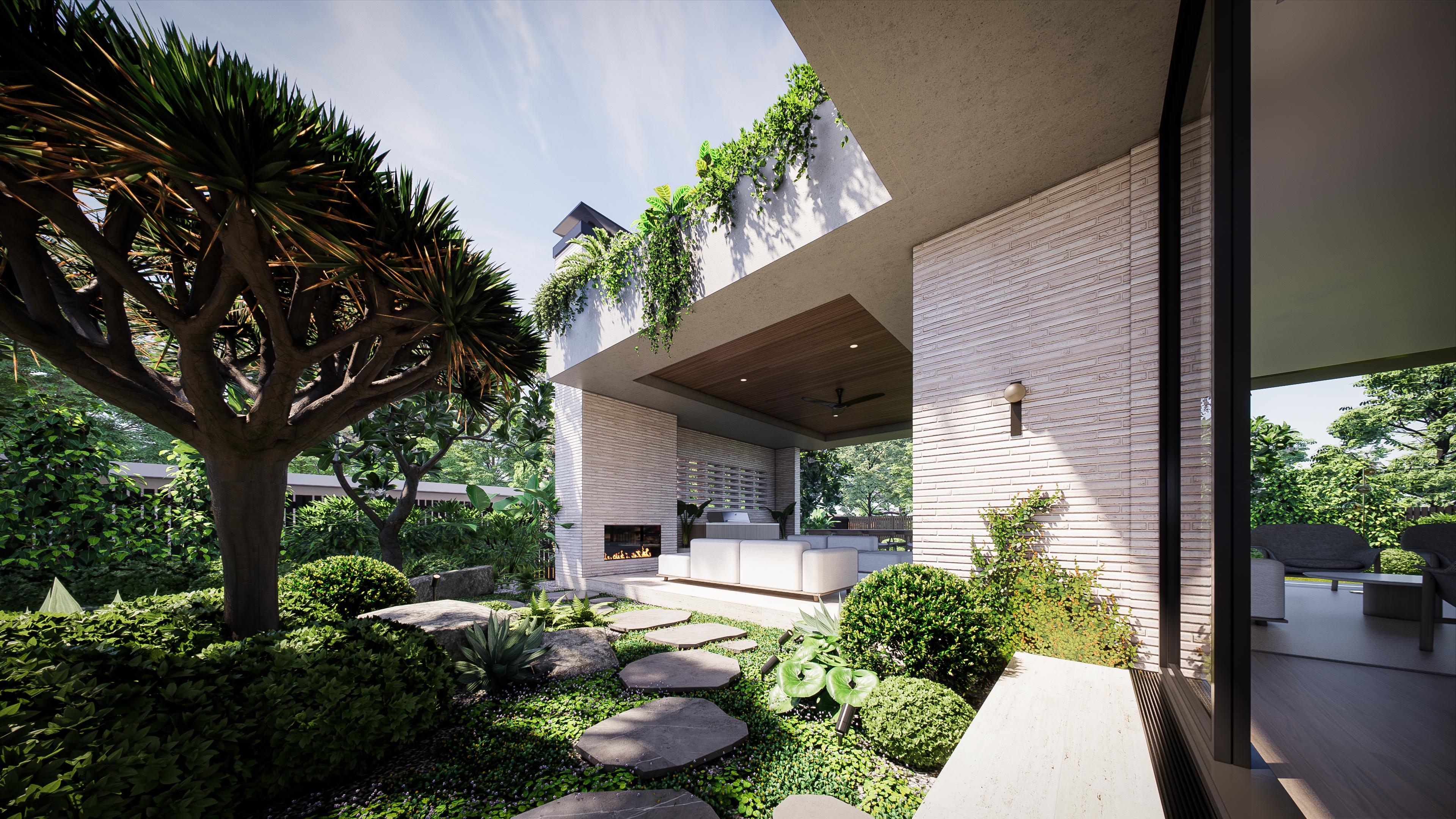 Outdoor alfresco lounge with white sofas and a linear fireplace set against a tall white brick chimney and garden path