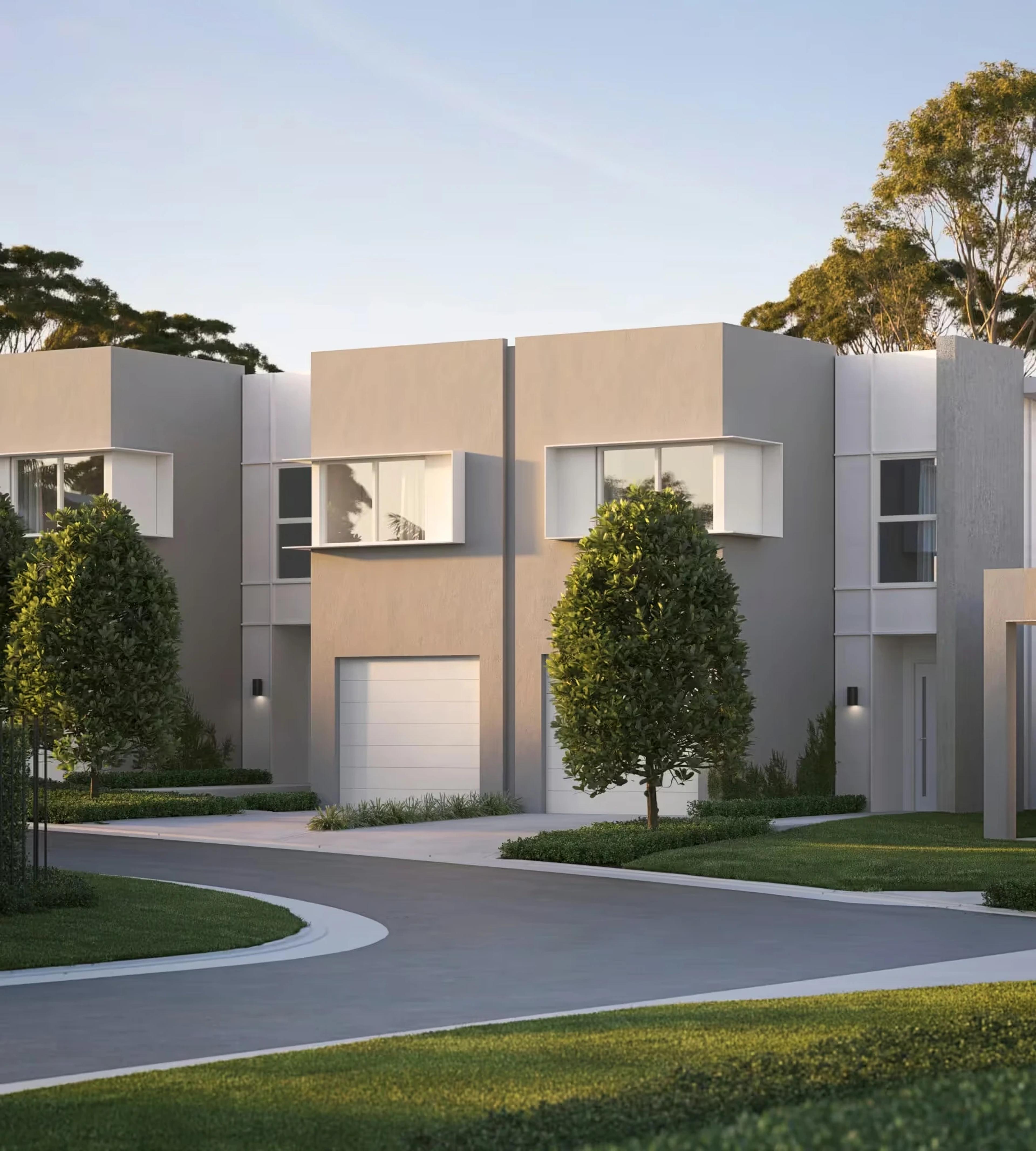 Rendered townhouse row along a curved driveway with trees